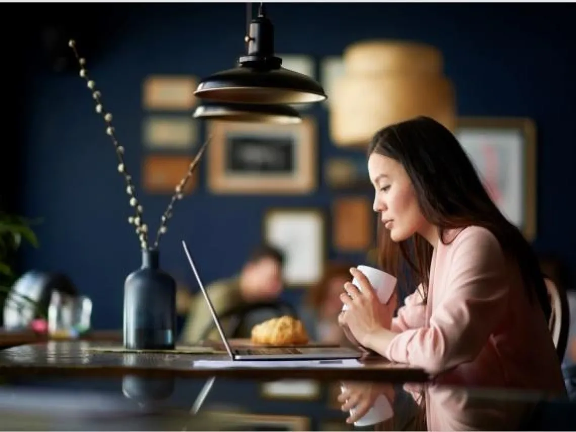 woman looking at laptop 